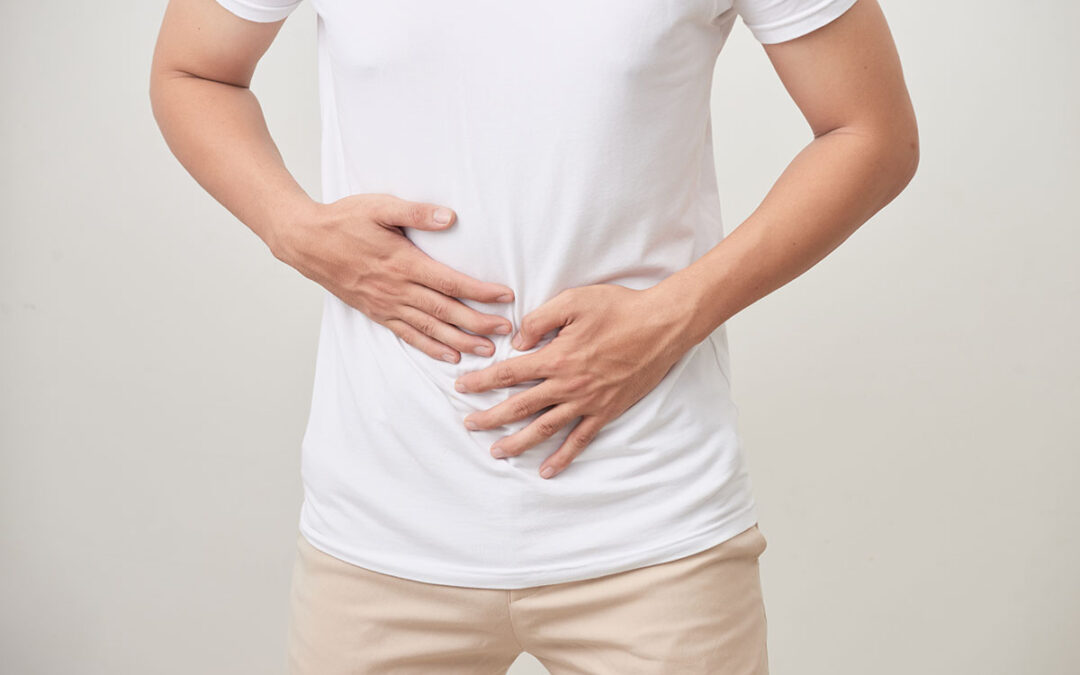 Unhappy man suffering from stomach ache